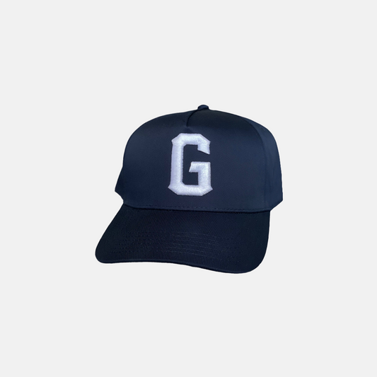 Navy Blue Trucker Hat with a White Logo on the Front, Adjustable Strap, Curved Brim, and Good Fortune curved in the back